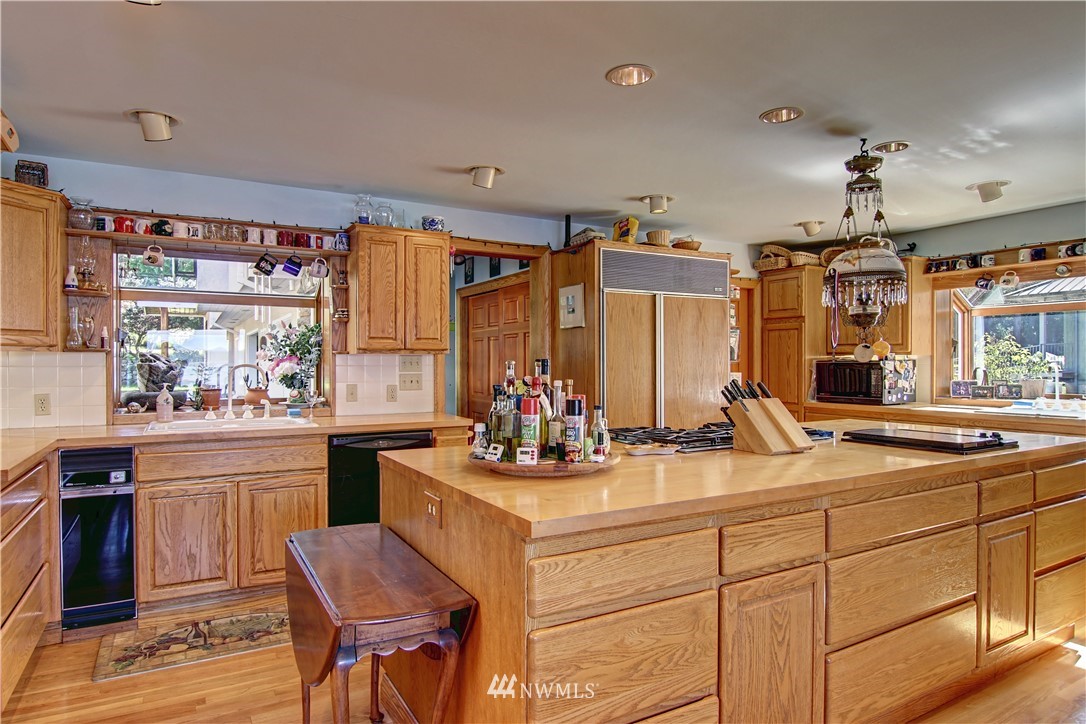 2461 Turn Point Road Friday Harbor, WA 98250 - Photo 5 of 25 a kitchen with a sink and cabinets