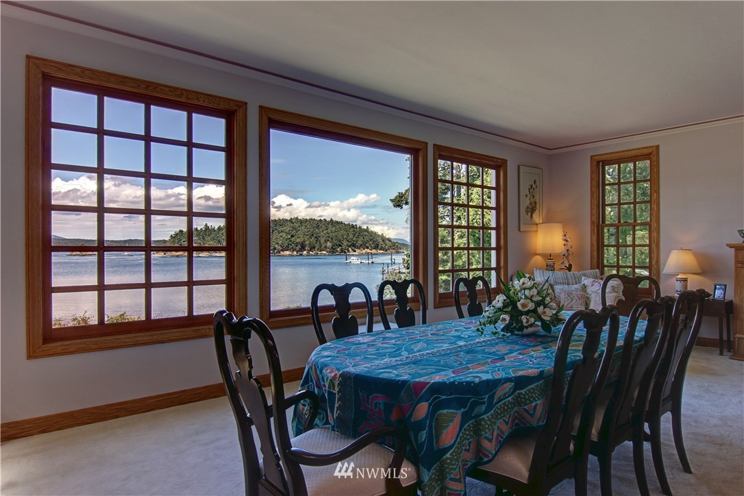 2461 Turn Point Road Friday Harbor, WA 98250 - Photo 7 of 25 a dining room with furniture window and wooden floor