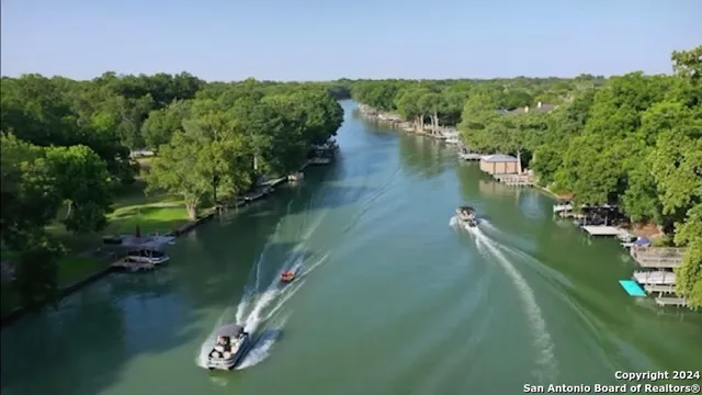 a view of a lake with houses