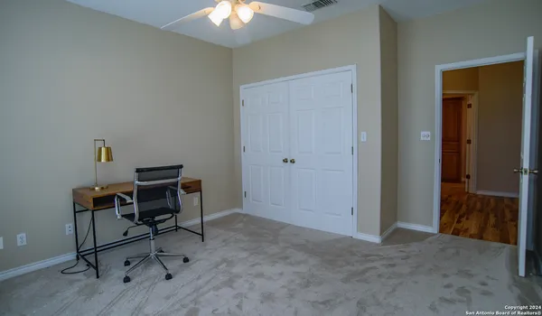 a view of a workspace with furniture