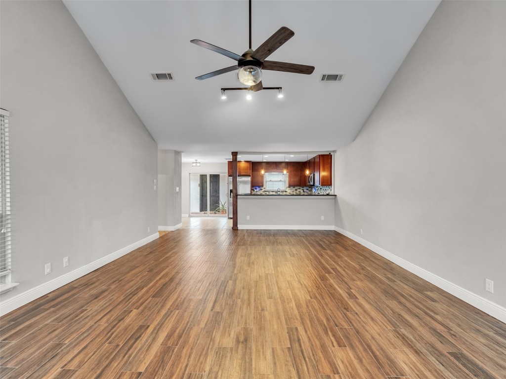 2703 Shady Lane Webster, TX 77598 - Photo 8 of 25 Spacious family room with a stylish breakfast bar view