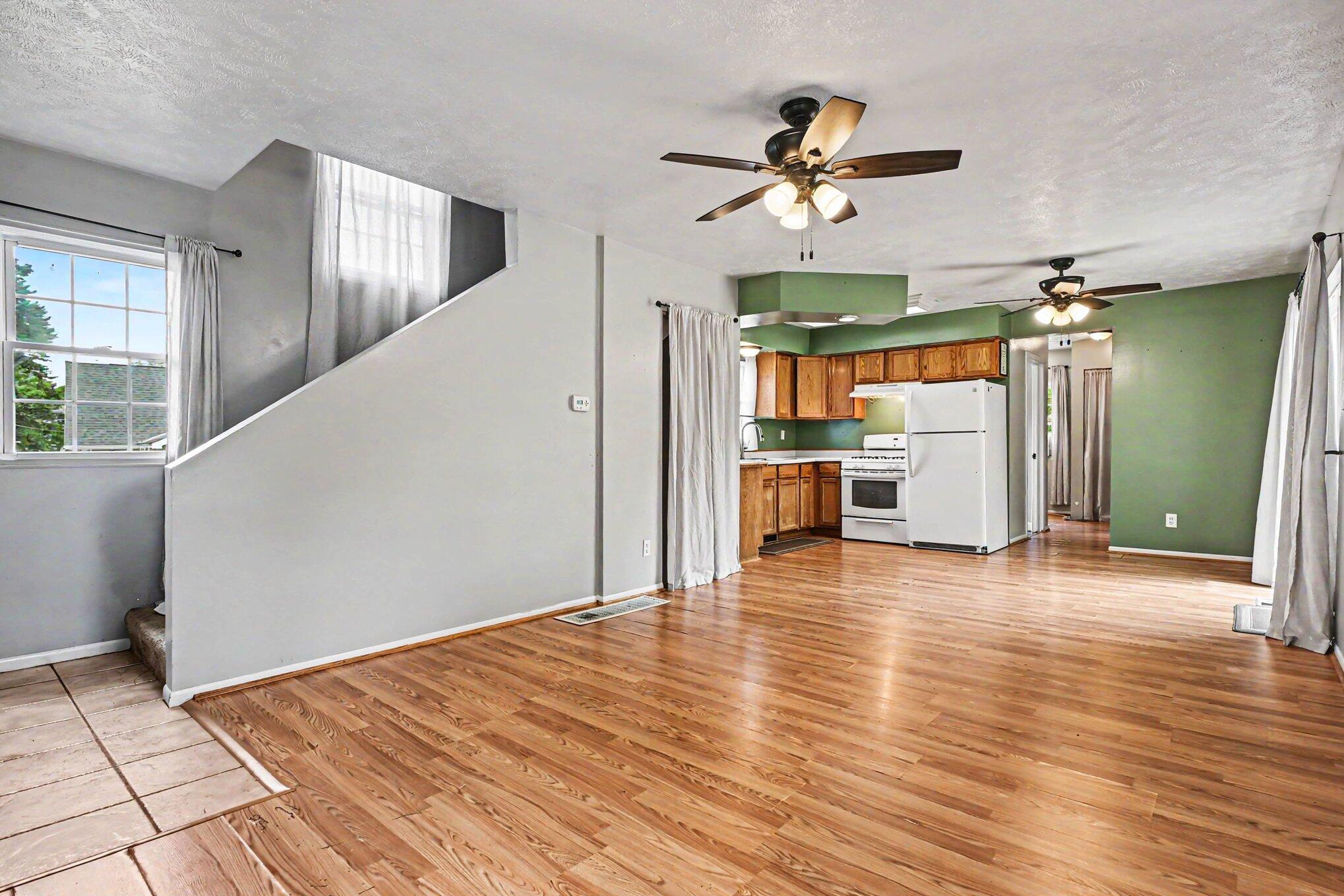 115 McClung Road La Porte, IN 46350 - Photo 5 of 31 a view of empty room with wooden floor and fan