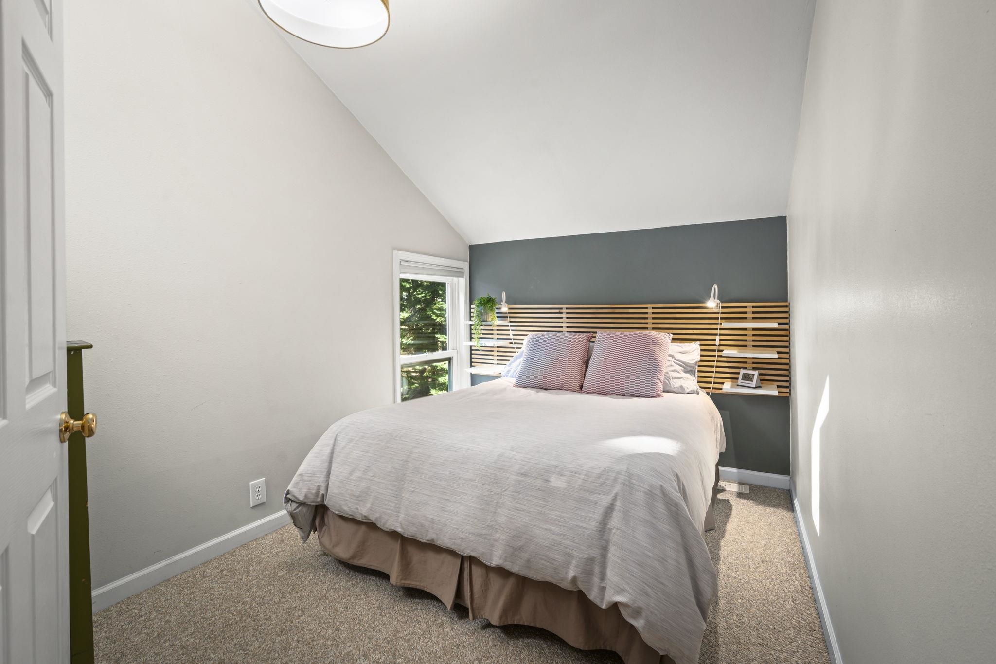6415 Flicker Avenue Homewood, CA 96141 - Photo 12 of 28 a bedroom with a bed and a window
