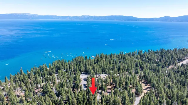 a view of a lush green hillside and a houses