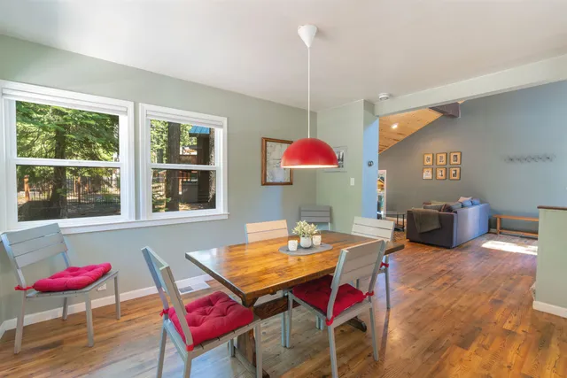 a dining room with a table or chairs and a wooden floor