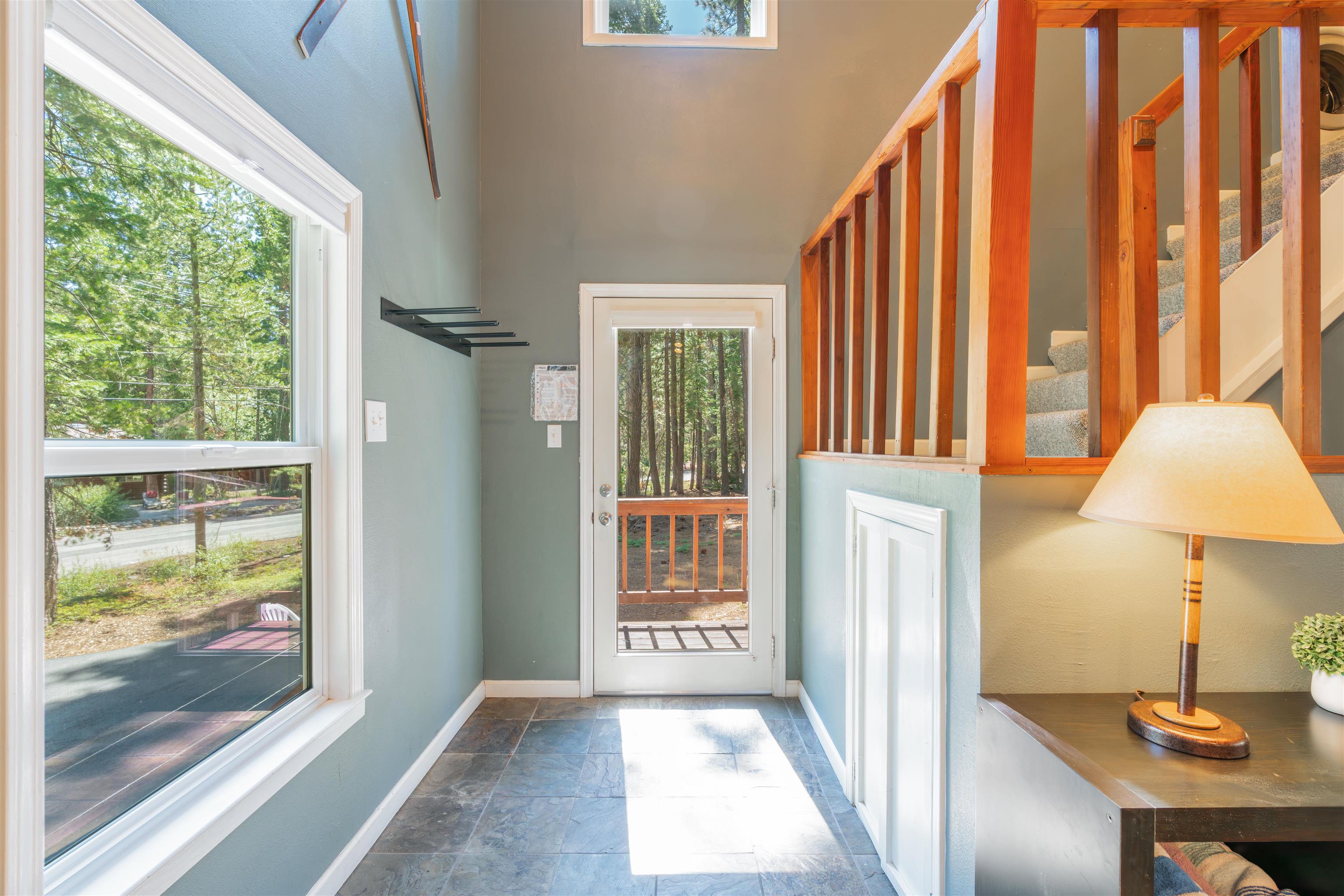 6415 Flicker Avenue Homewood, CA 96141 - Photo 5 of 28 a view of a room with a window and a bath tub