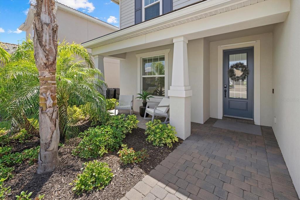 3508 Anchor Bay Trail Lakewood Ranch, FL 34211 - Photo 3 of 74 front view of a house with a porch