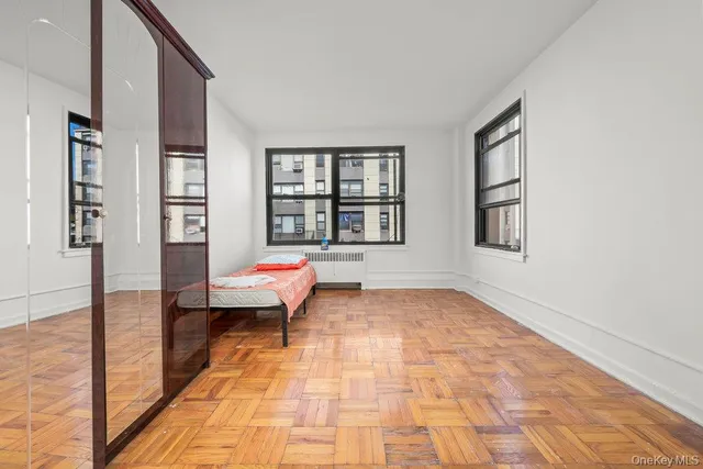 a room with pool and window