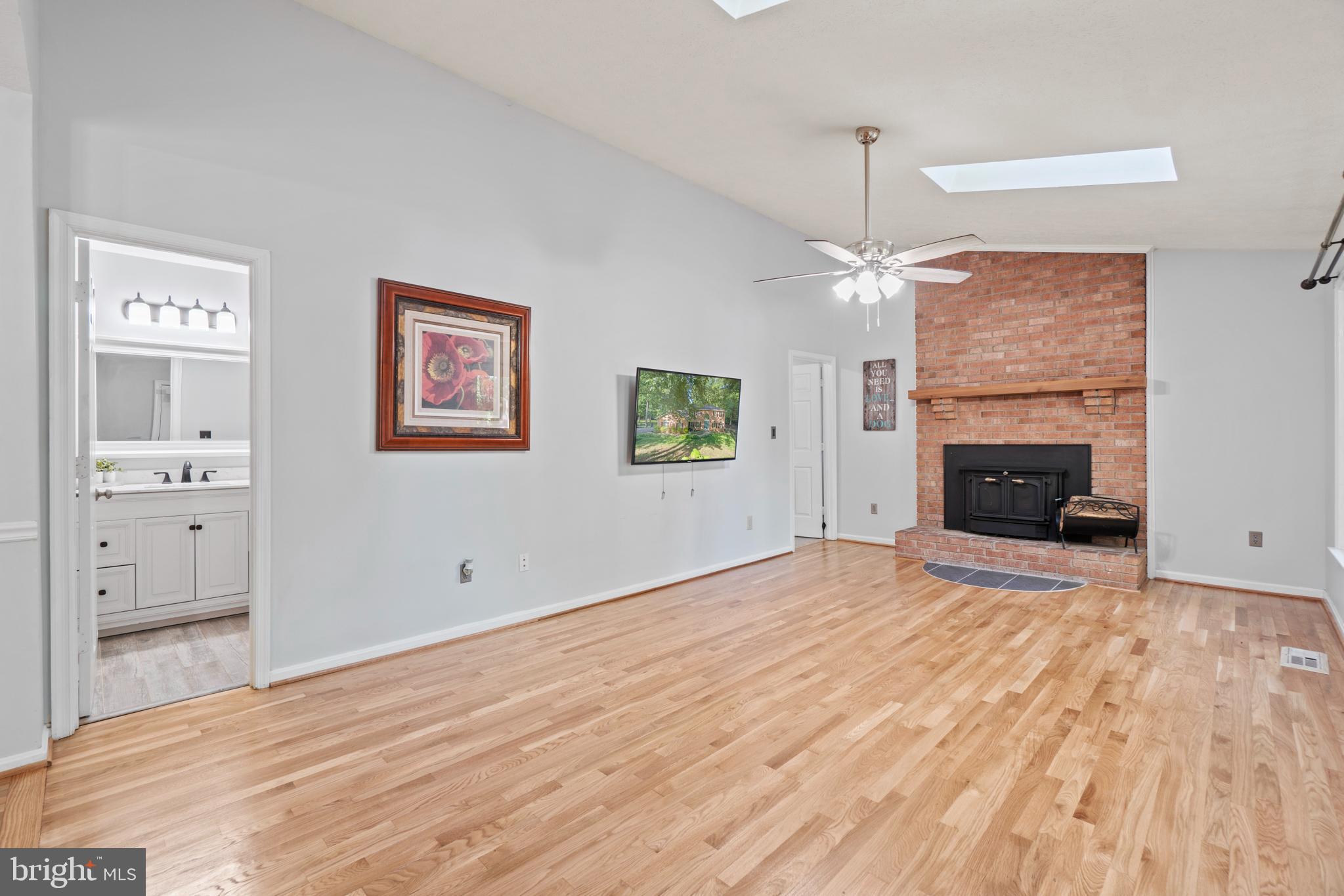 481 Hope Road Stafford, VA 22554 - Photo 11 of 45 Brick fireplace in family room