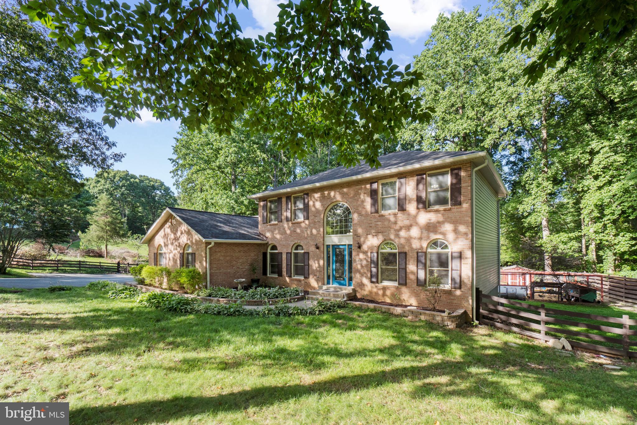 481 Hope Road Stafford, VA 22554 - Photo 3 of 45 Side view of home with fenced in yard