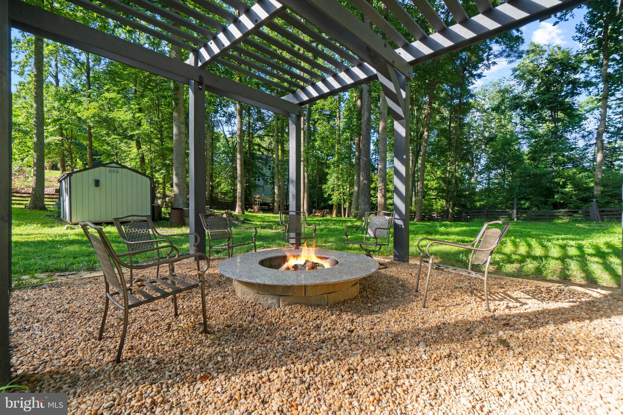 481 Hope Road Stafford, VA 22554 - Photo 45 of 45 Fire pit under the pergola