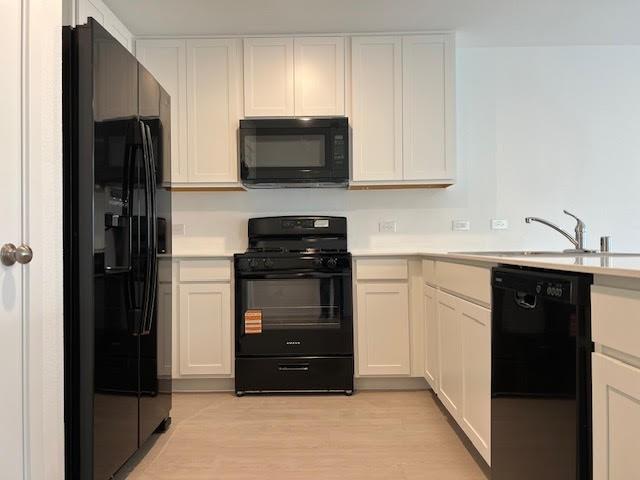 1038 Raintree Road Princeton, TX 75407 - Photo 8 of 36 a kitchen with stainless steel appliances granite countertop a refrigerator and a stove top oven