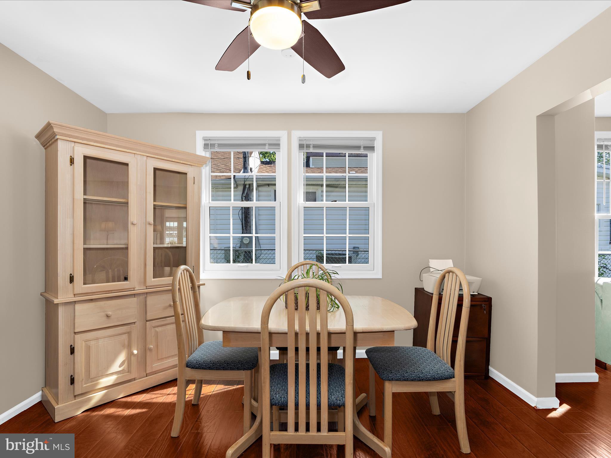 336 Bar Harbor Road Pasadena, MD 21122 - Photo 11 of 82 a view of a dining room with furniture window and wooden floor