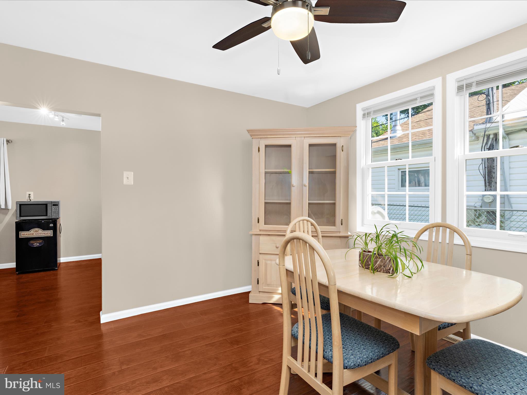 336 Bar Harbor Road Pasadena, MD 21122 - Photo 12 of 82 a view of a dining room with furniture window and wooden floor