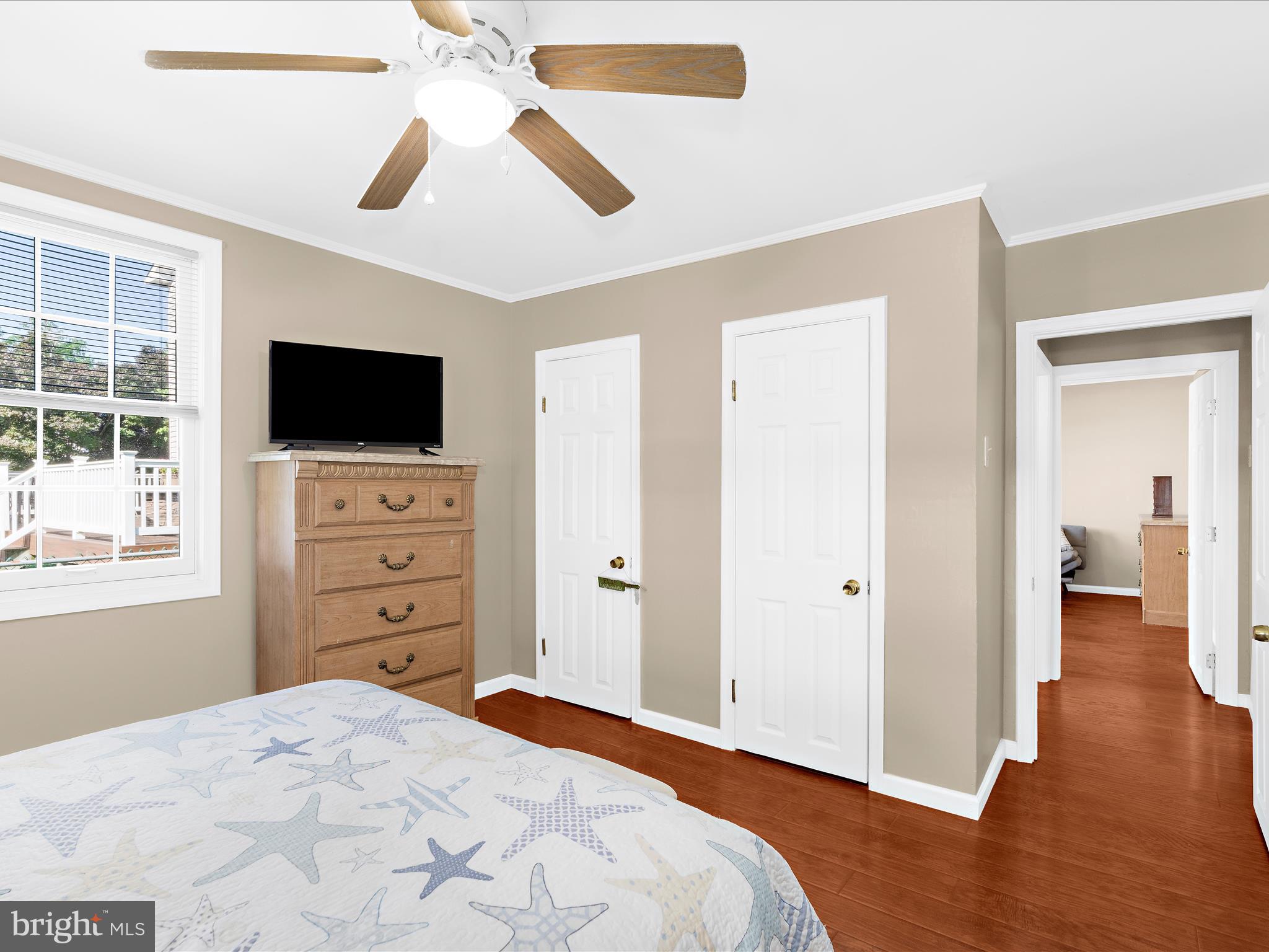 336 Bar Harbor Road Pasadena, MD 21122 - Photo 17 of 82 a bedroom with a bed and a flat screen tv