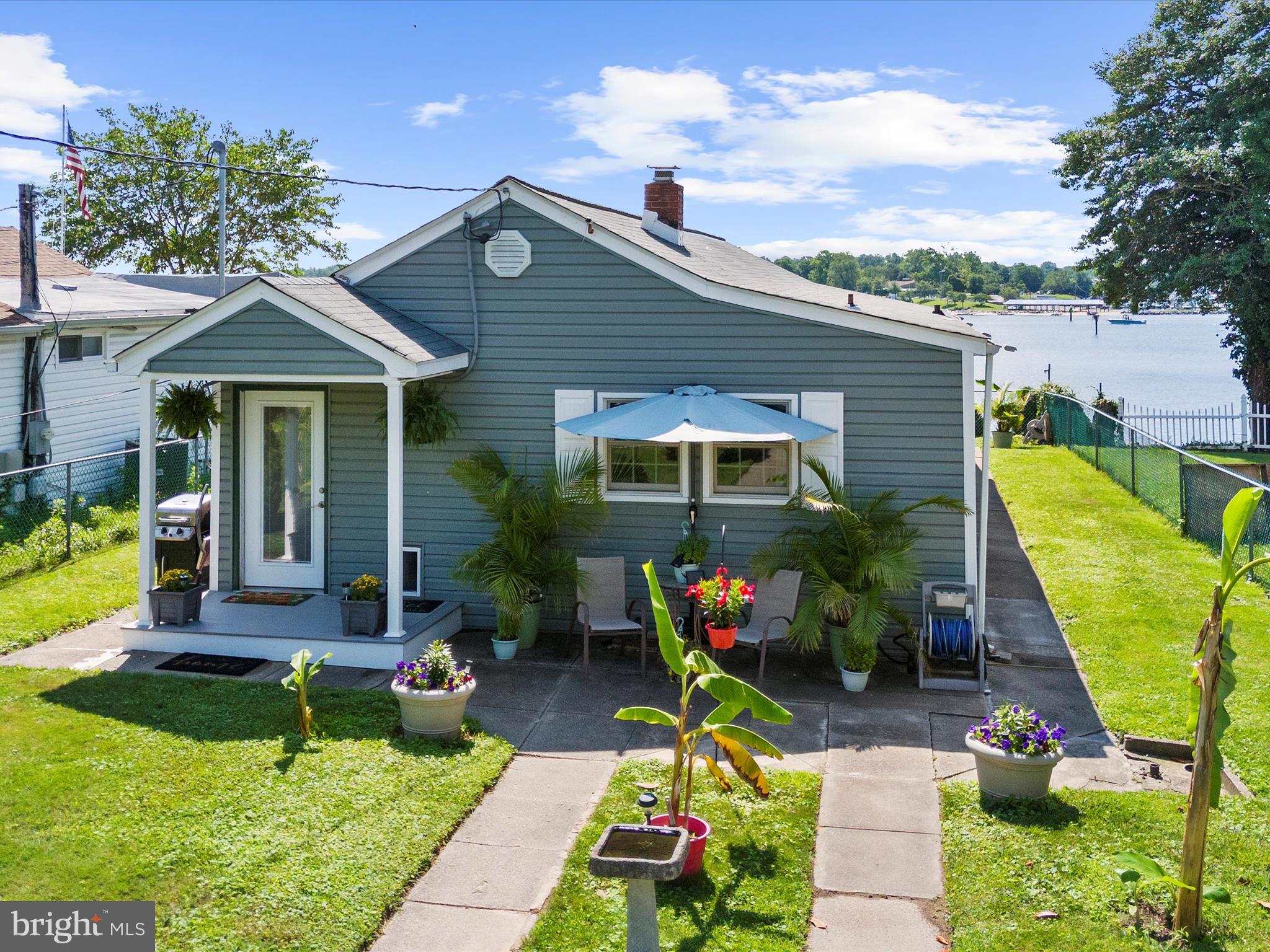 336 Bar Harbor Road Pasadena, MD 21122 - Photo 30 of 82 a front view of a house with garden