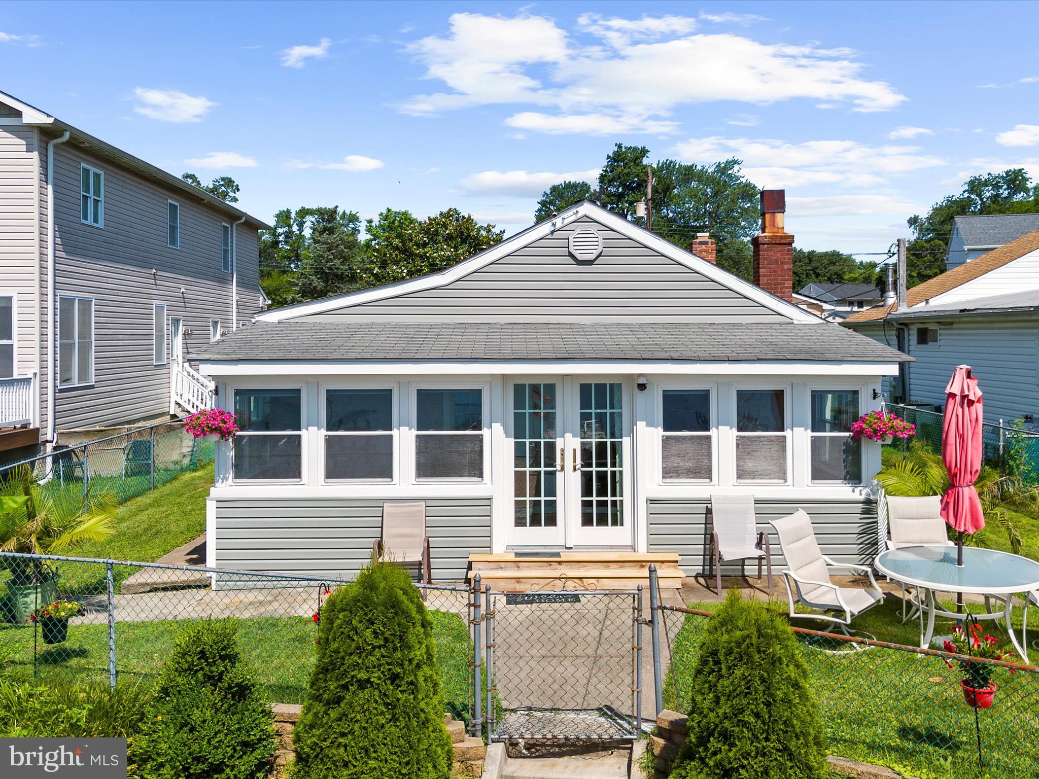 336 Bar Harbor Road Pasadena, MD 21122 - Photo 44 of 82 a front view of a house with a yard