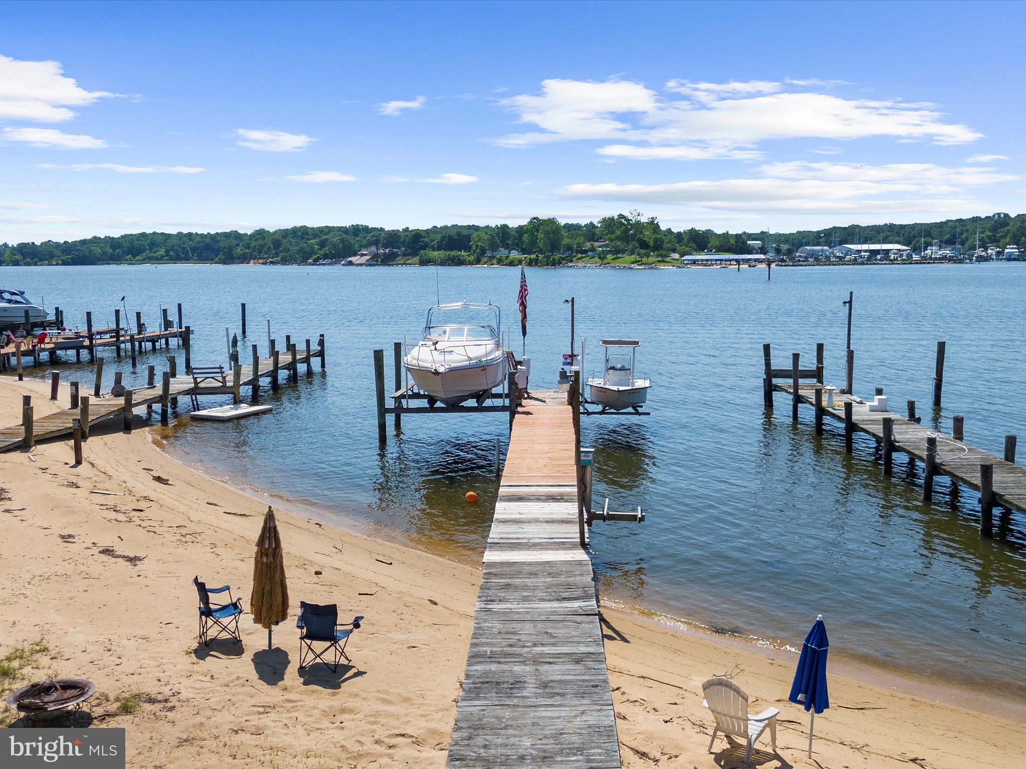 336 Bar Harbor Road Pasadena, MD 21122 - Photo 52 of 82 a view of a lake with outdoor seating