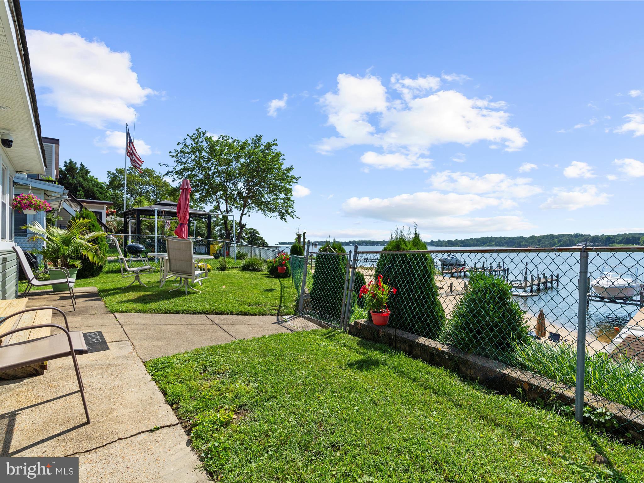 336 Bar Harbor Road Pasadena, MD 21122 - Photo 53 of 82 a view of a garden with a slide in the back