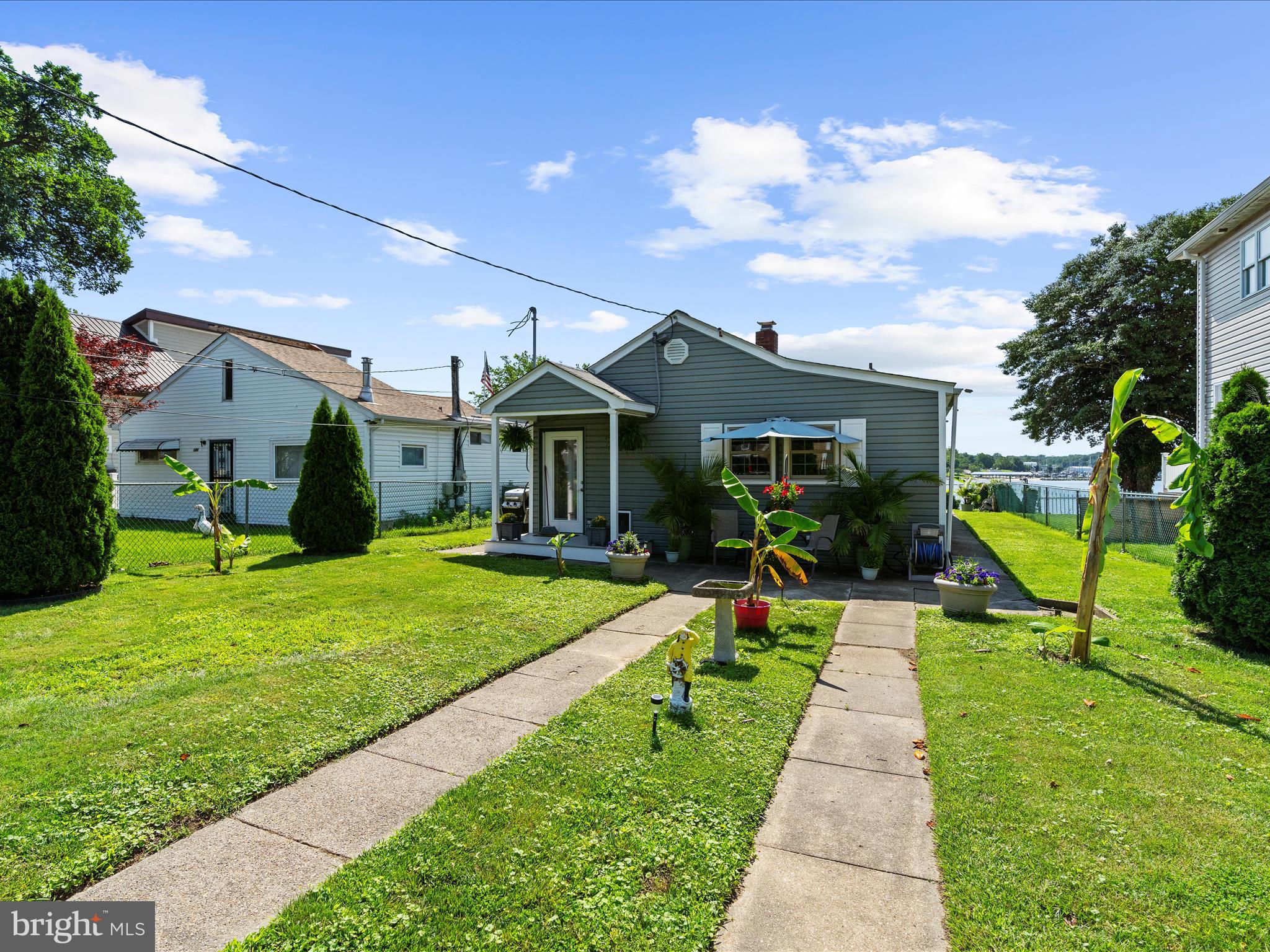 336 Bar Harbor Road Pasadena, MD 21122 - Photo 63 of 82 a view of a house with a backyard porch and sitting area