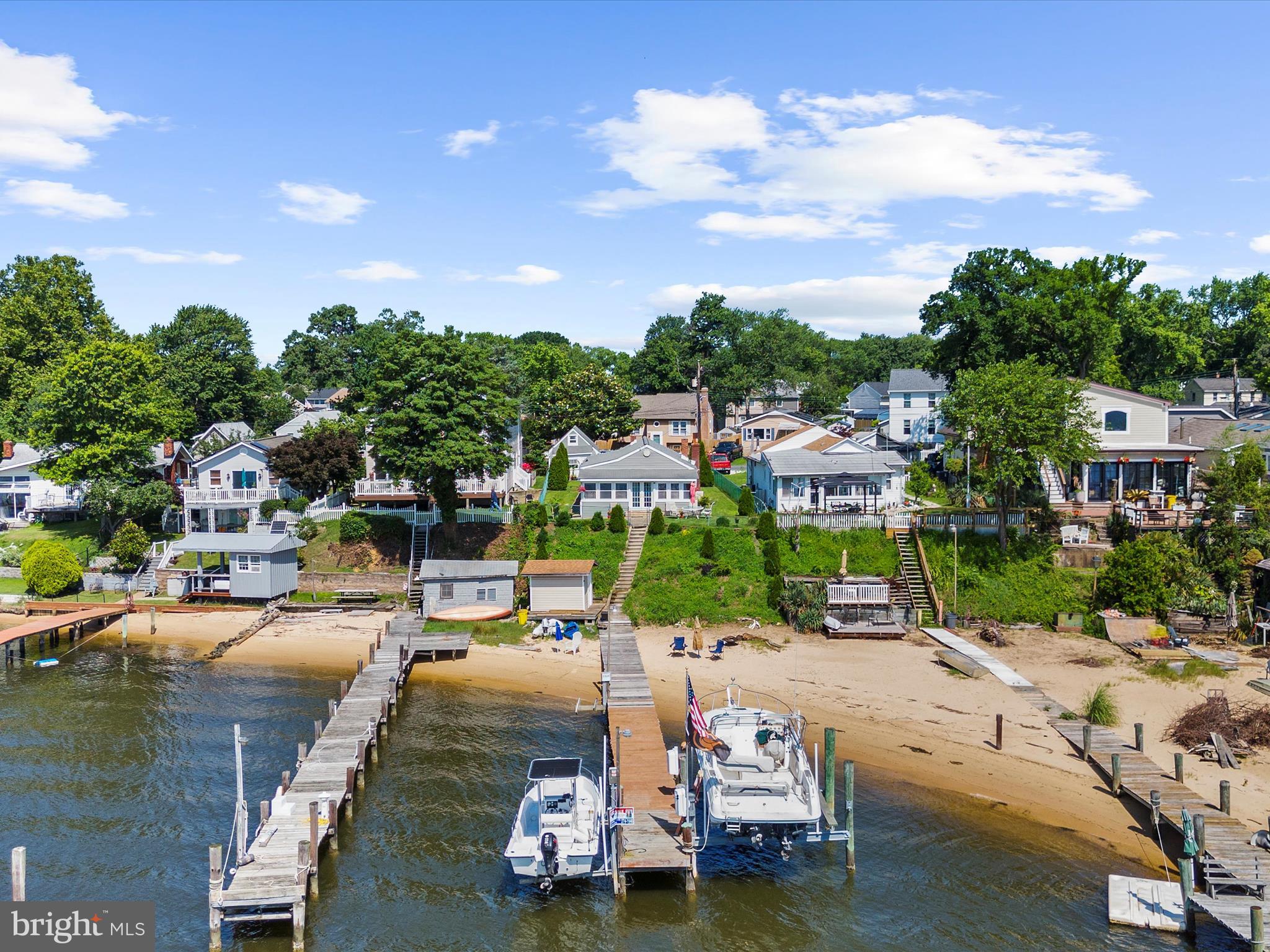 336 Bar Harbor Road Pasadena, MD 21122 - Photo 68 of 82 a view of a lake with a house