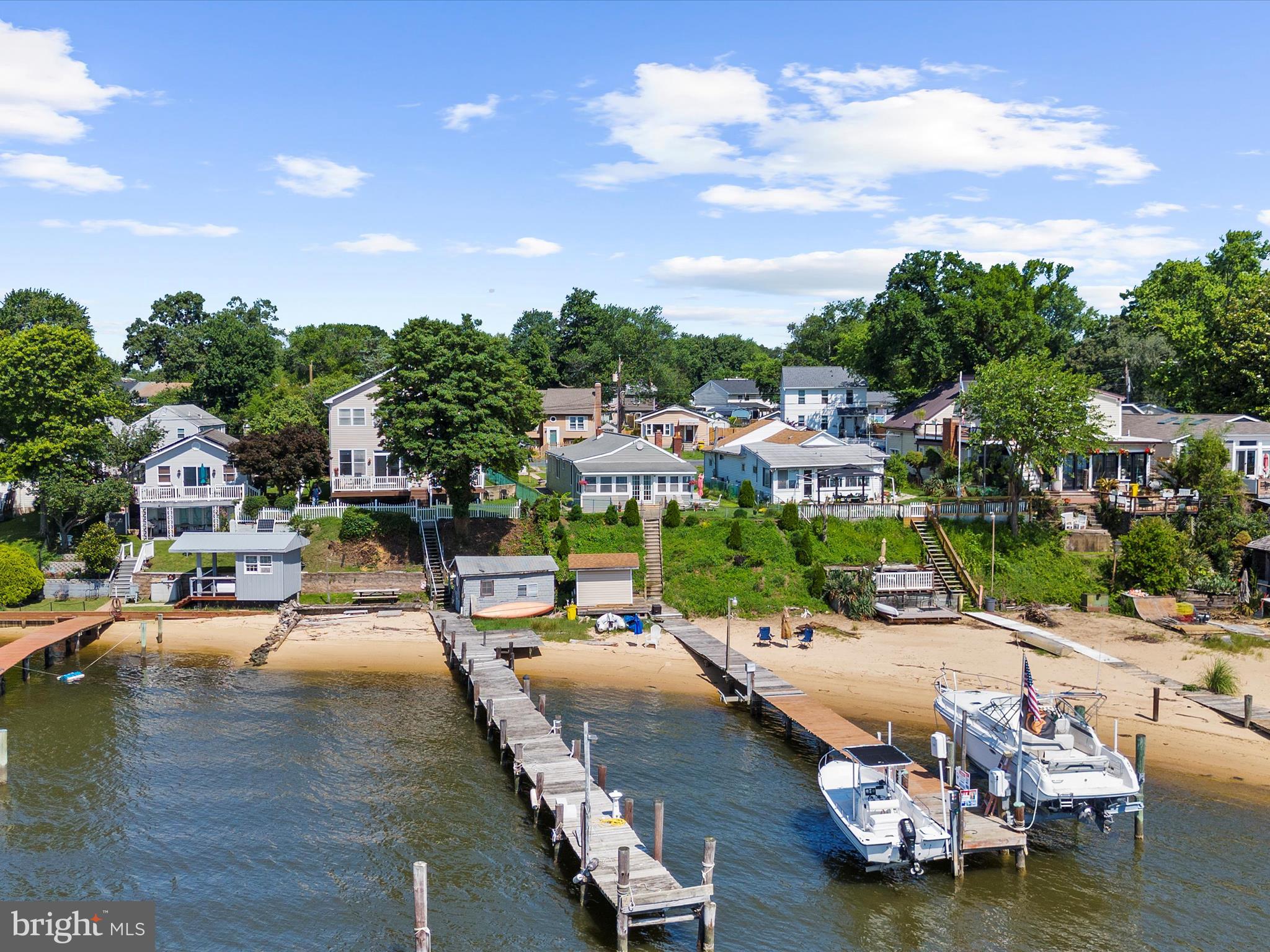 336 Bar Harbor Road Pasadena, MD 21122 - Photo 72 of 82 a view of a swimming pool with lounge chairs in patio
