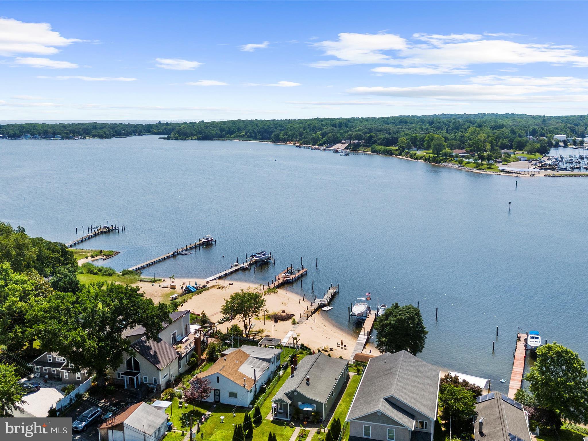 336 Bar Harbor Road Pasadena, MD 21122 - Photo 76 of 82 a view of a lake with sitting area