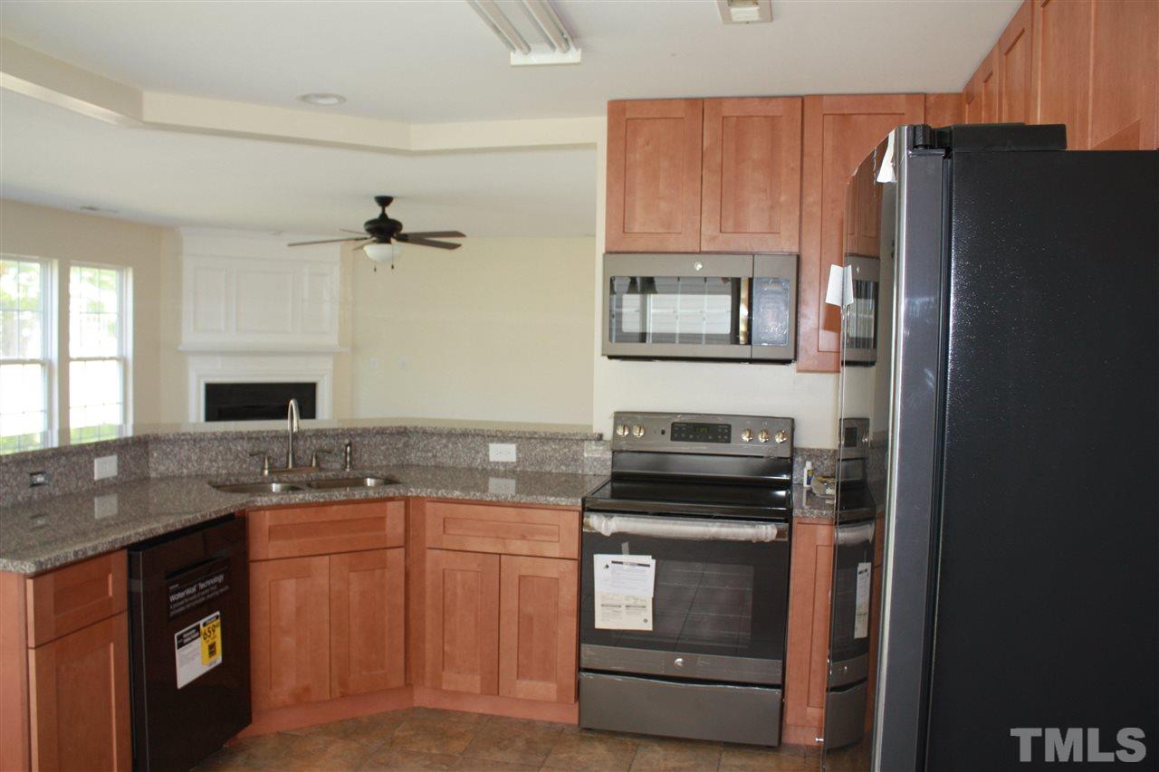 New cabinets, granite countertops, and appliances.