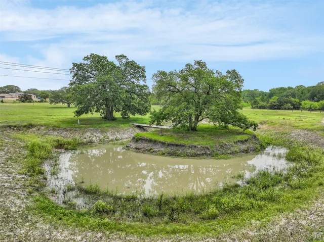 a view of a lake view with a yard