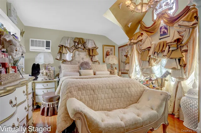 a bed room with a bed and chair