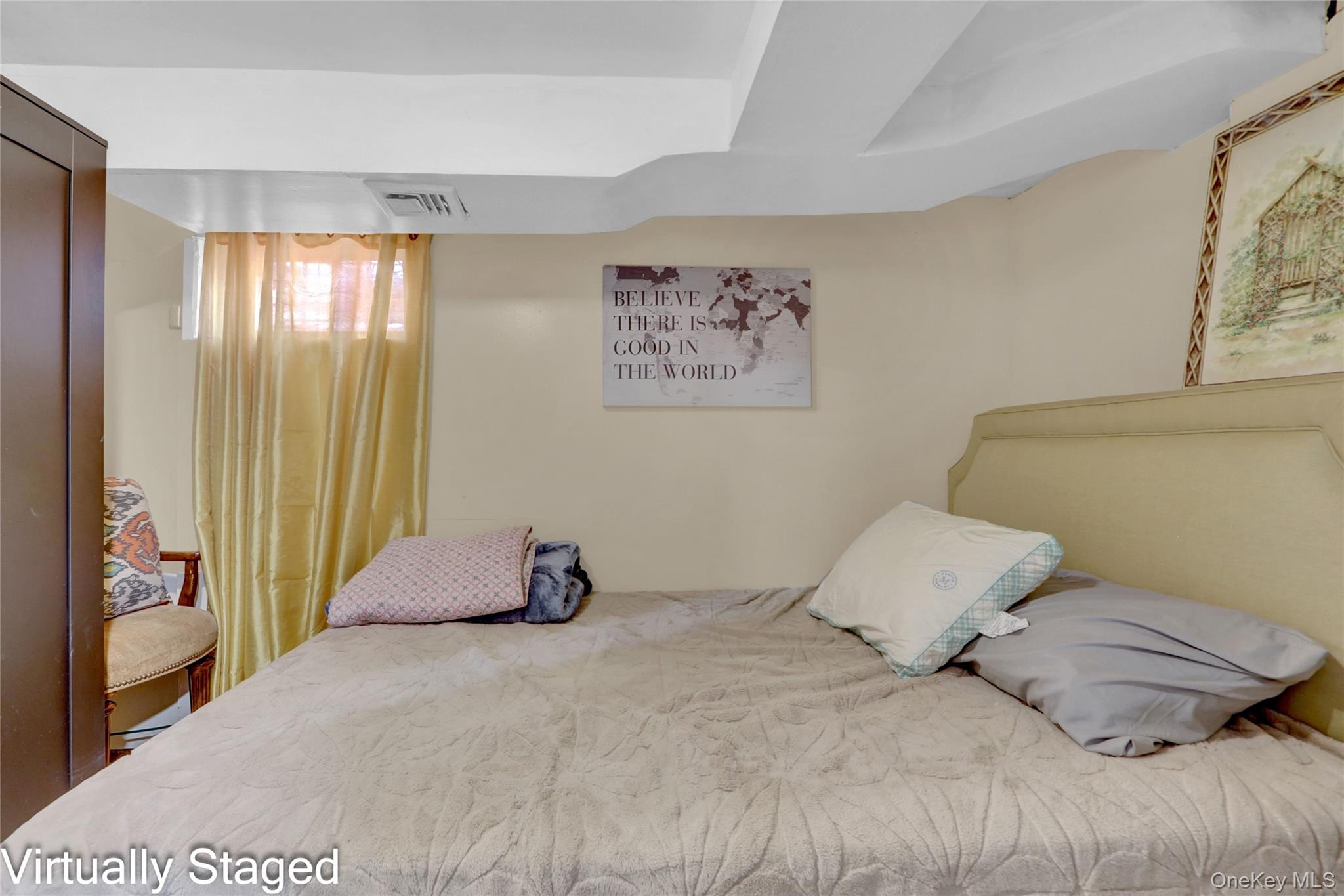 50 Crystal Street Elmont, NY 11003 - Photo 27 of 40 a bedroom with a bed and wooden floor