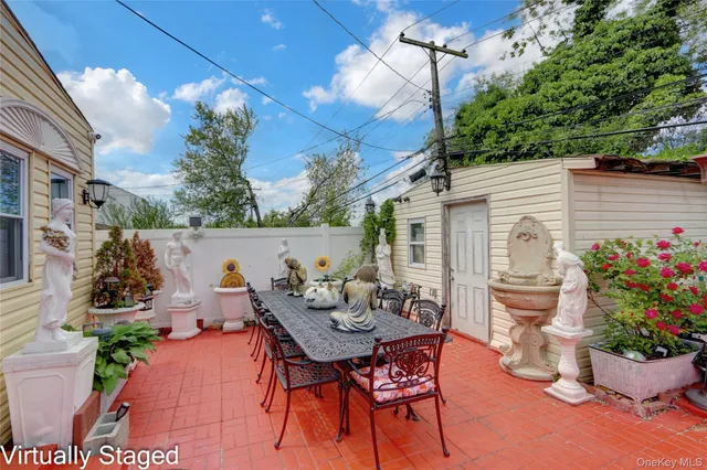 a view of a potted flower in the corridor