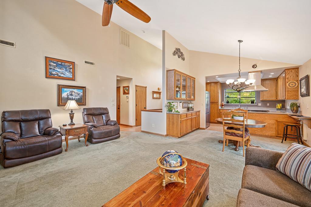 3971 Donner Trail Placerville, CA 95667 - Photo 19 of 78 a living room with furniture kitchen view and a chandelier