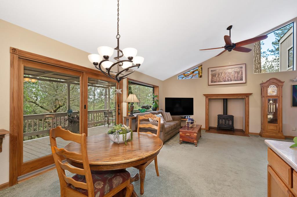 3971 Donner Trail Placerville, CA 95667 - Photo 22 of 78 a view of a dining room with furniture window and outside view