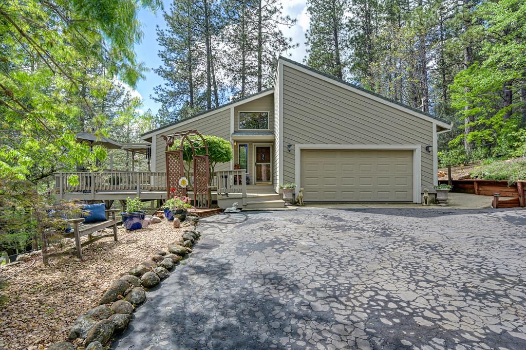 3971 Donner Trail Placerville, CA 95667 - Photo 3 of 78 a view of house with backyard space and patio
