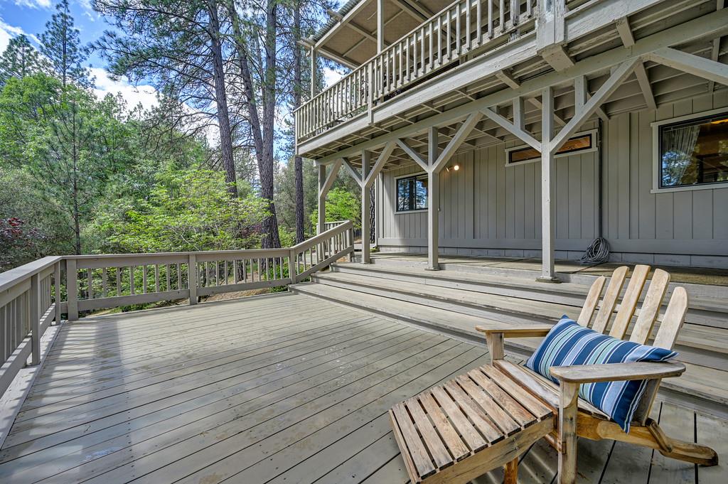 3971 Donner Trail Placerville, CA 95667 - Photo 55 of 78 a view of a chair and tables on the wooden floor