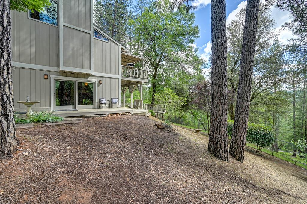 3971 Donner Trail Placerville, CA 95667 - Photo 59 of 78 a view of a house with a tree in front of it