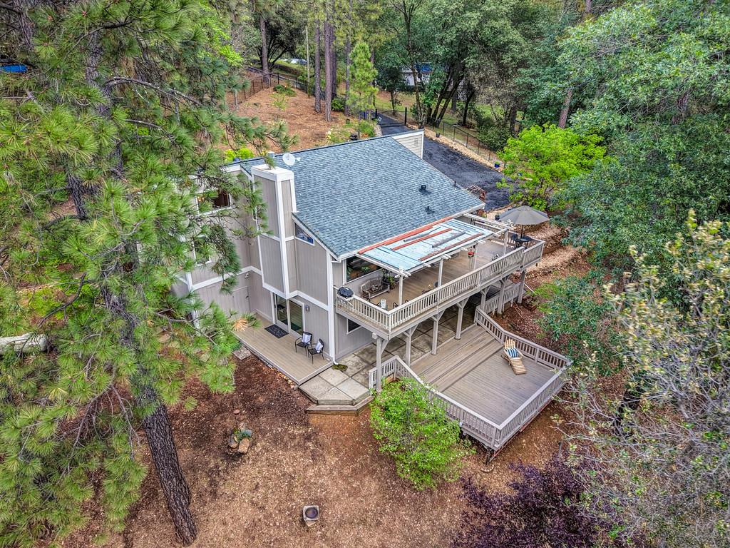 3971 Donner Trail Placerville, CA 95667 - Photo 67 of 78 an aerial view of a house with garden space and a deck