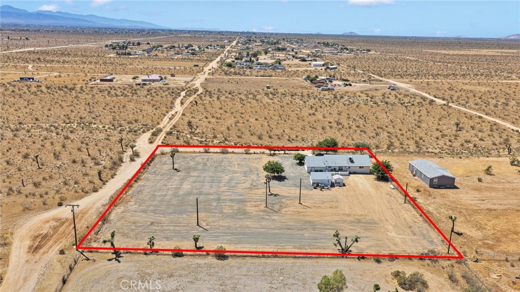 8038 Begonia Road Phelan, CA 92371 - Photo 45 of 49 an aerial view of residential houses with outdoor space