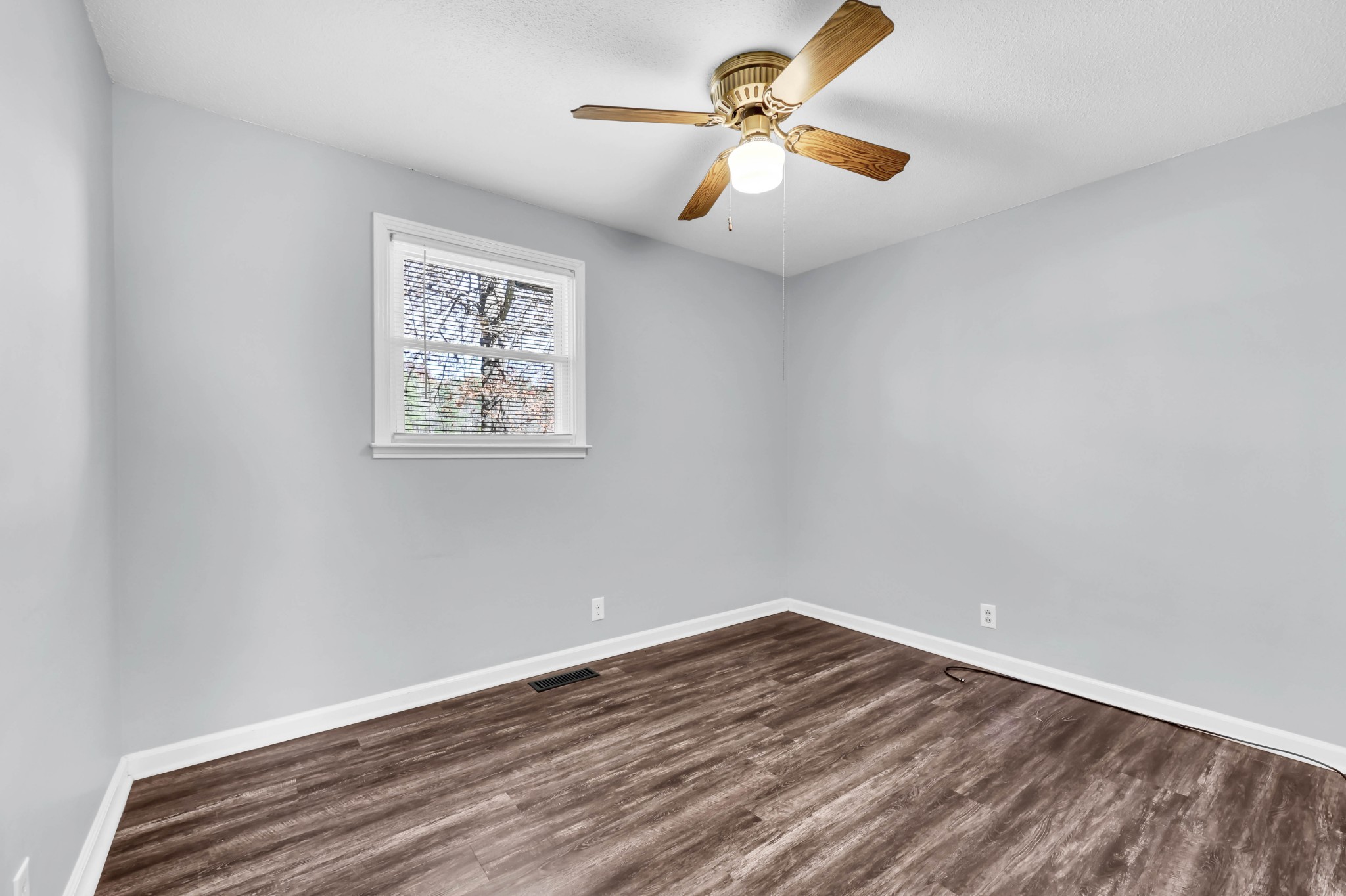 4660 Dover Road Indian Mound, TN 37079 - Photo 18 of 30 wooden floor in an empty room with a window