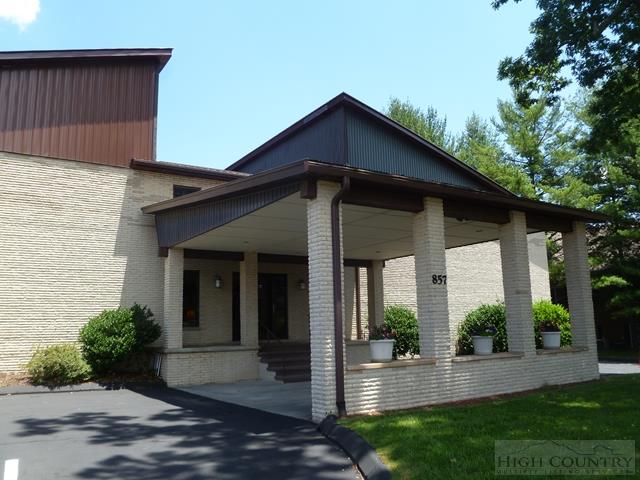 857 State Farm Road, Unit 103 Boone, NC 28607 - Photo 1 of 25 a front view of a house with garden