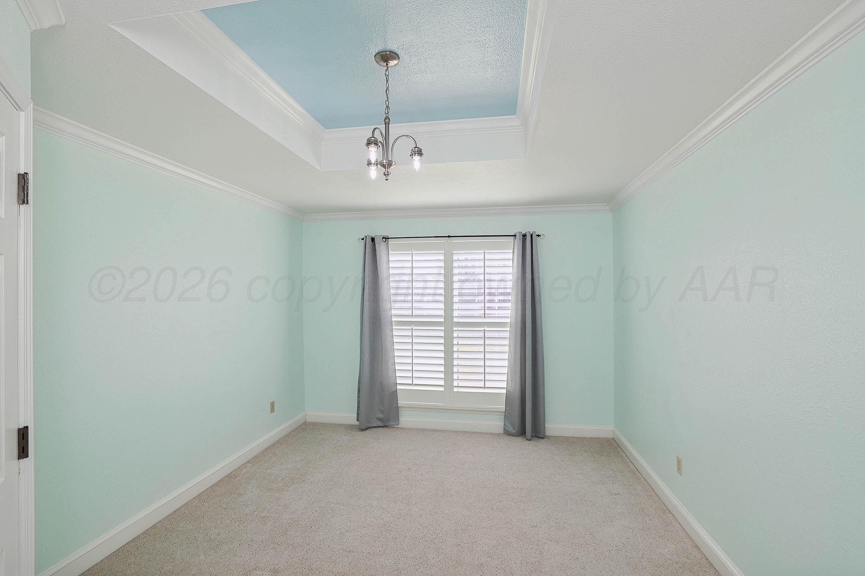 6904 Alpine Lane Amarillo, TX 79109 - Photo 18 of 45 a view of an empty room with a window