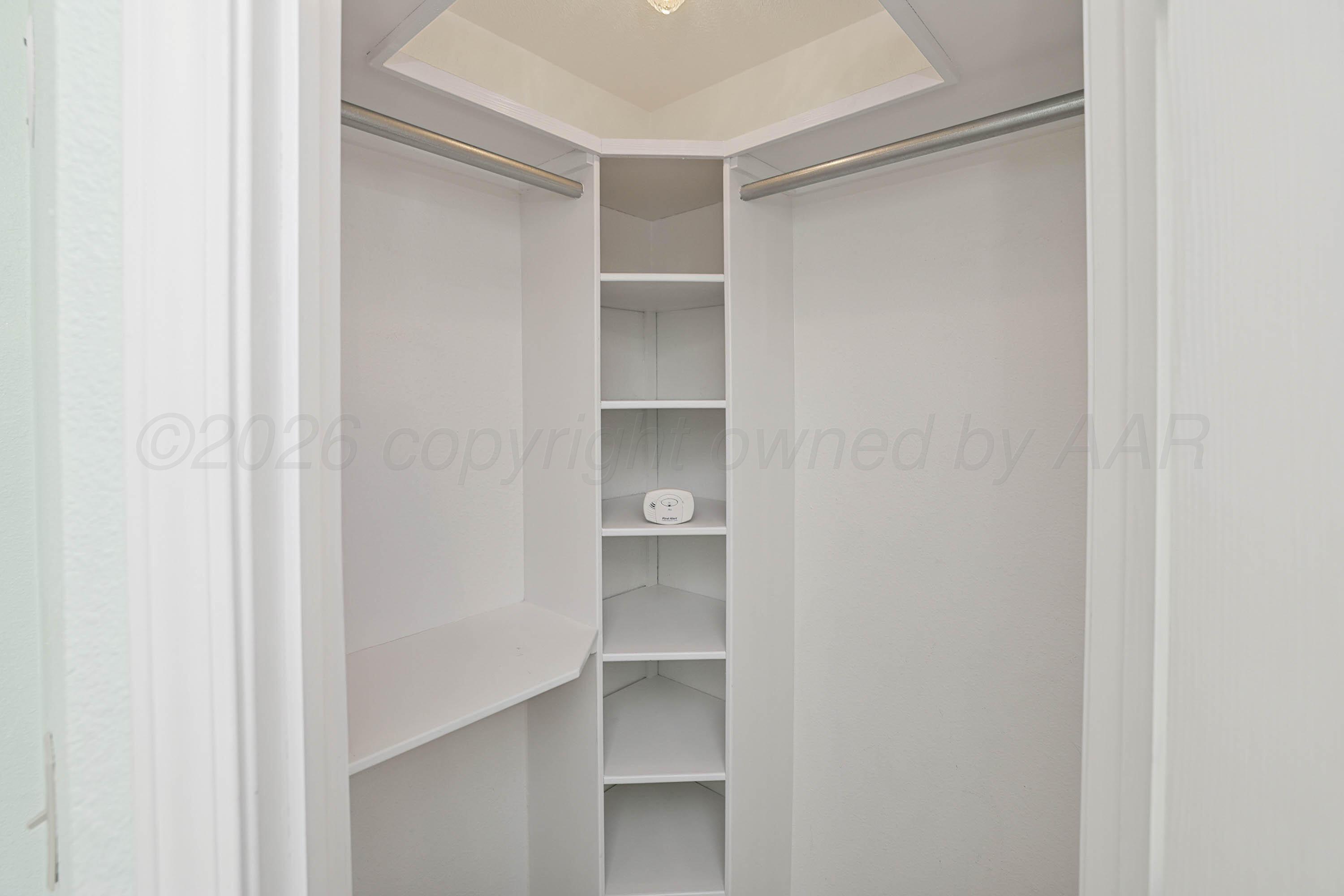 6904 Alpine Lane Amarillo, TX 79109 - Photo 20 of 45 a view of an empty walk in closet