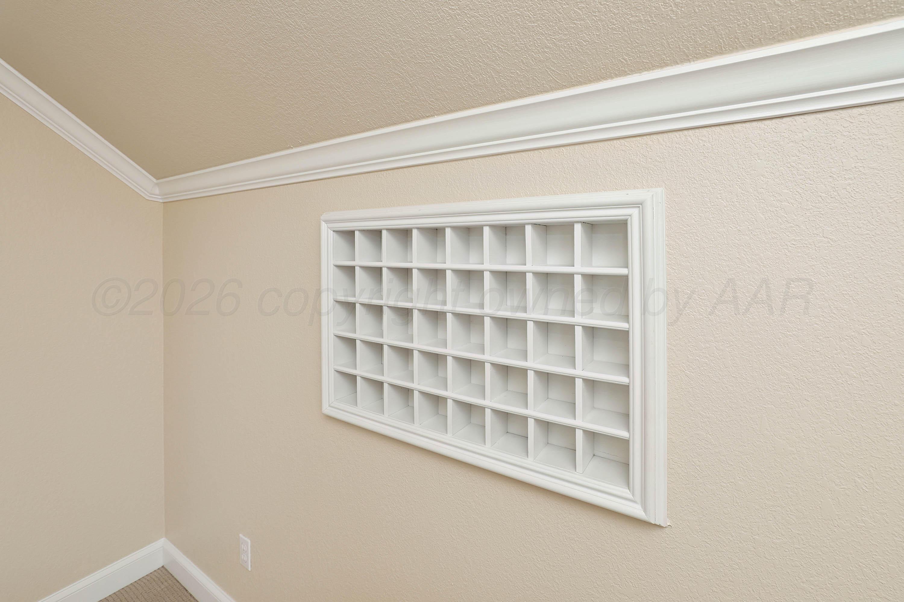 6904 Alpine Lane Amarillo, TX 79109 - Photo 30 of 45 a view of an empty room with empty shelves