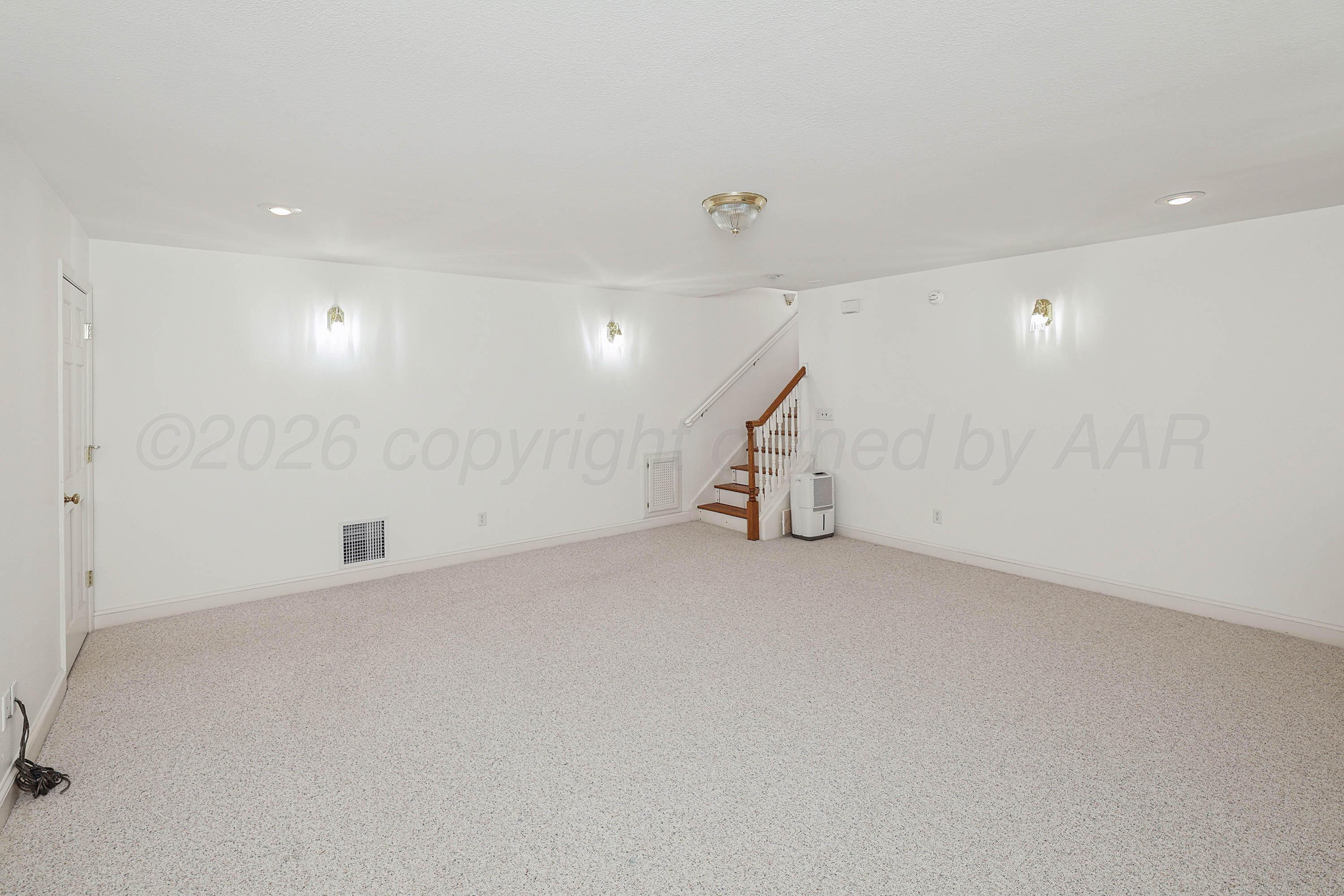 6904 Alpine Lane Amarillo, TX 79109 - Photo 37 of 45 an empty room with white walls and white walls