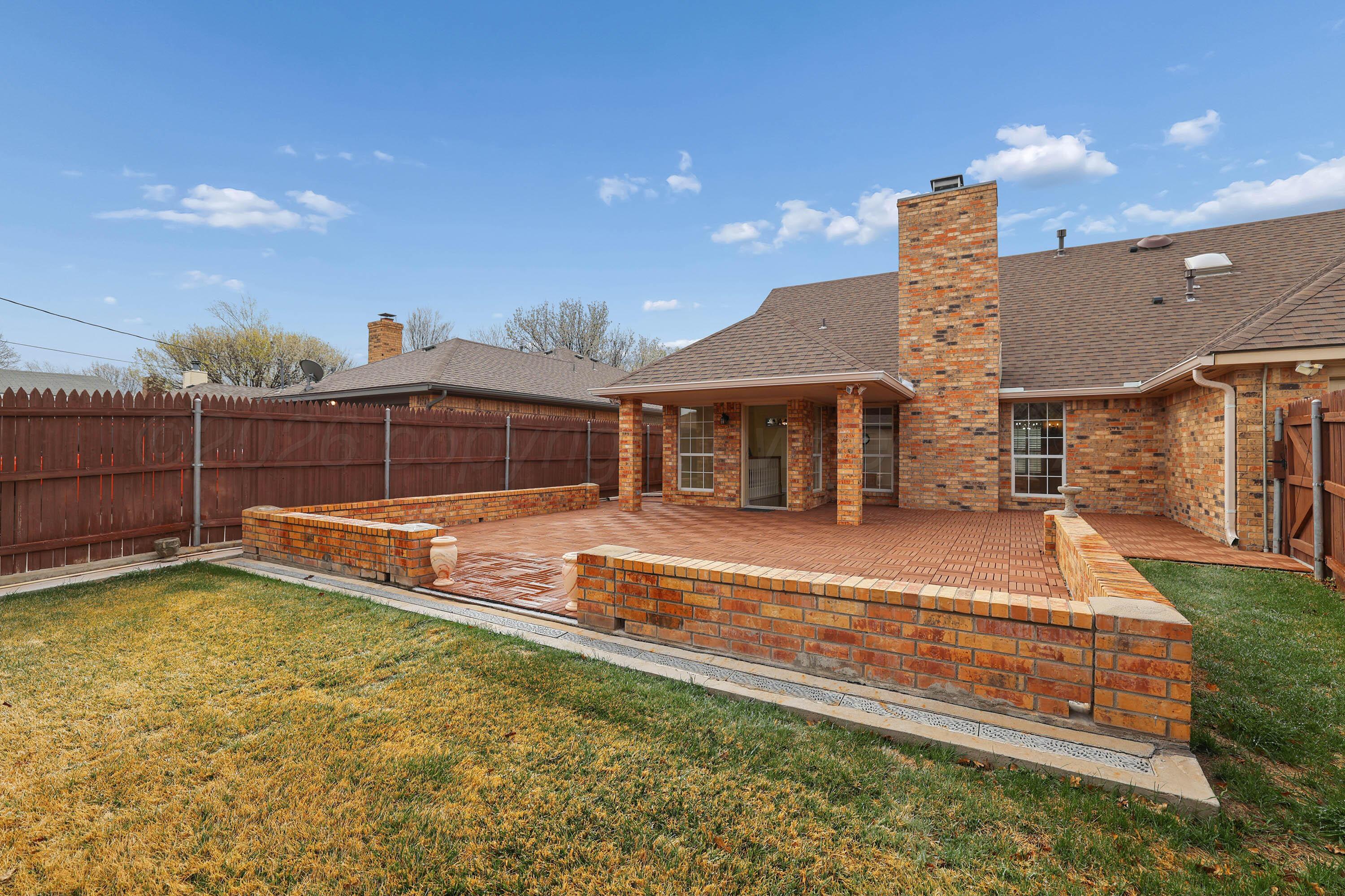 6904 Alpine Lane Amarillo, TX 79109 - Photo 40 of 45 a view of a house with pool and sitting area