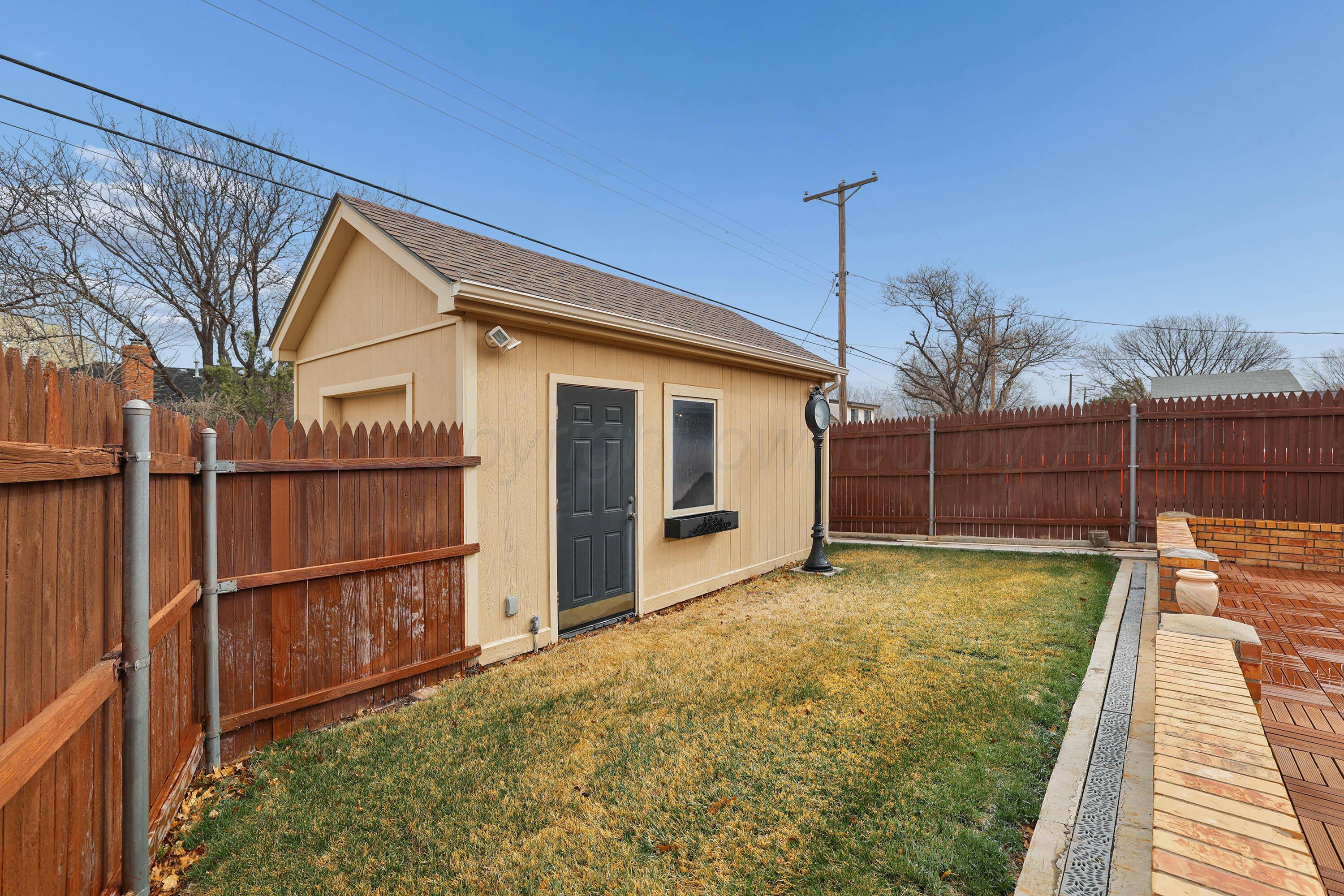 6904 Alpine Lane Amarillo, TX 79109 - Photo 41 of 45 a view of a house with wooden fence