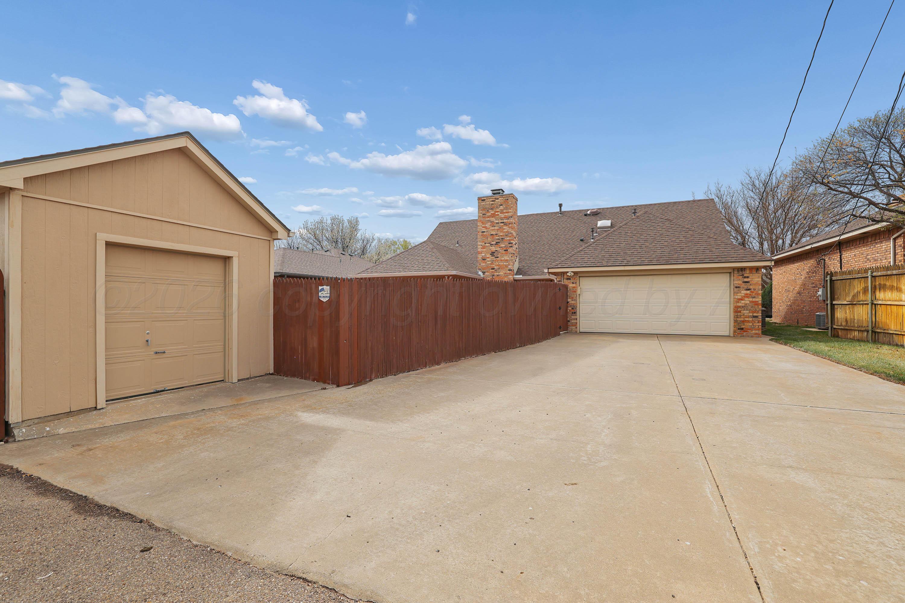 6904 Alpine Lane Amarillo, TX 79109 - Photo 45 of 45 a view of a house with a garage