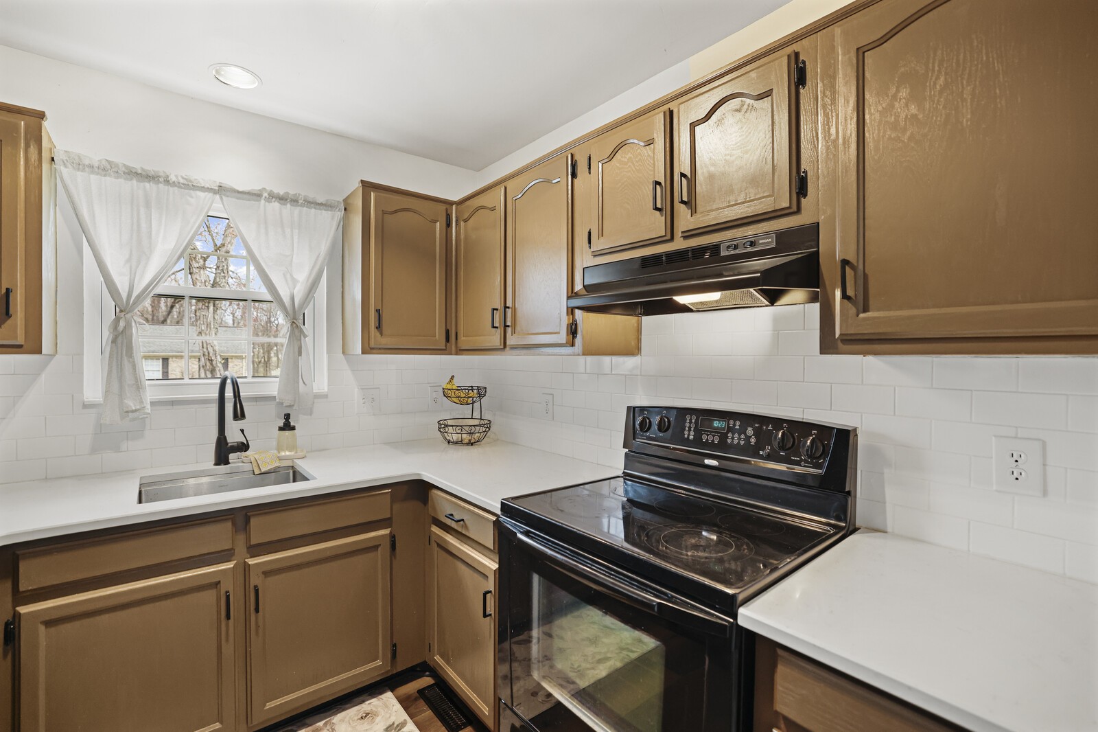 119 Pine Grove Road Mount Juliet, TN 37122 - Photo 12 of 37 a kitchen with stainless steel appliances a sink stove and cabinets