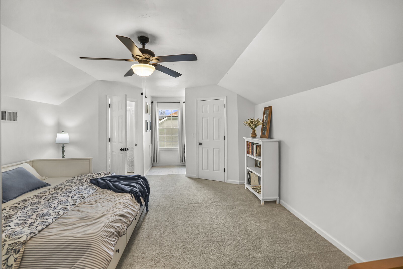 119 Pine Grove Road Mount Juliet, TN 37122 - Photo 22 of 37 a spacious bedroom with a bed and a ceiling fan